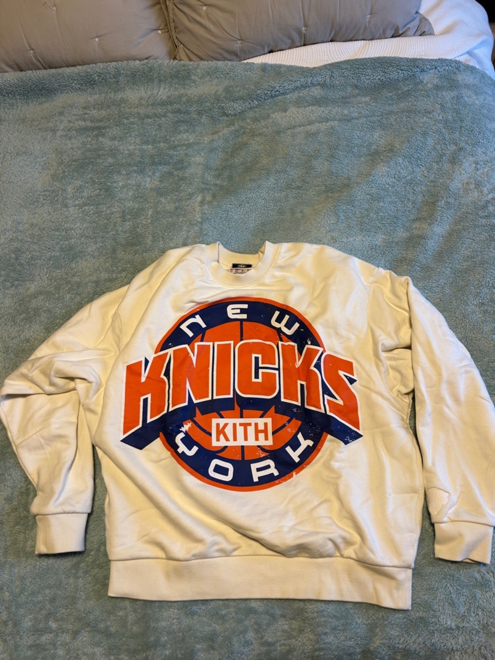 Kith White Crewneck Sweatshirt with Orange and Blue Knicks Logo